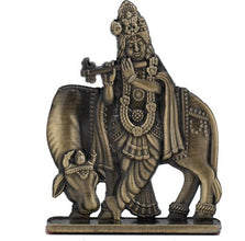 idol: Lord Krishna playing the bansuri (flute)