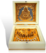 Idol: gold-plated Khatu Shyam Ji Charan Paduka and photo frame