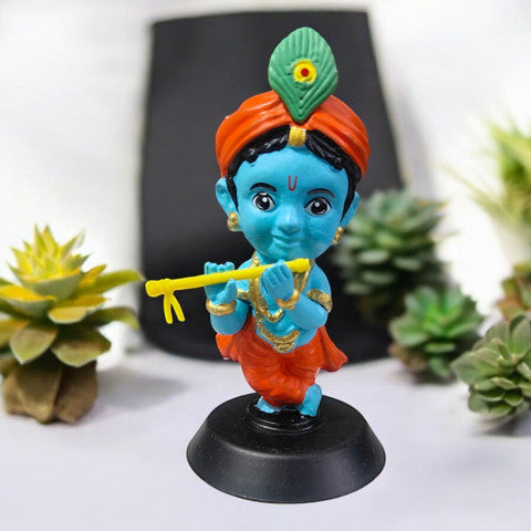 Idol: Lord Krishna playing the flute