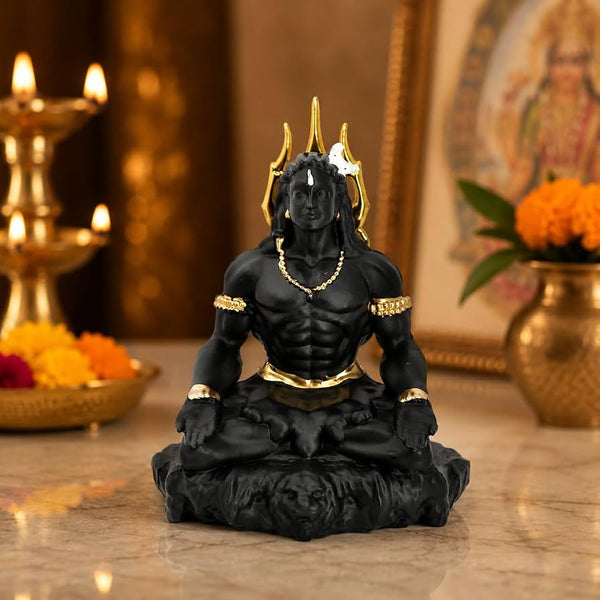 idol: matte black and gold Adiyogi Shiva meditation