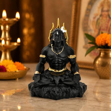 idol: matte black and gold Adiyogi Shiva meditation