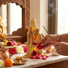 Idol: gold-toned metal figurine of Lord Hanuman