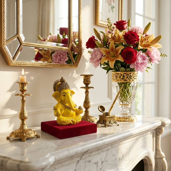 Idol: yellow and gold polyresin Lord Ganesha