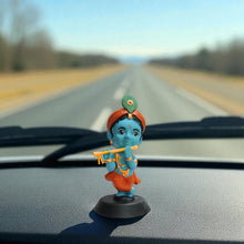 Idol: Lord Krishna playing the flute