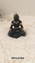 idol: matte black and gold Adiyogi Shiva meditation